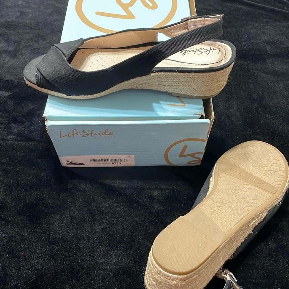 Black canvas espadrilles size 10. New in box.
